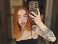 camgirl playing with dildo EvaOrange